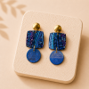 boucles d'oreilles en papier